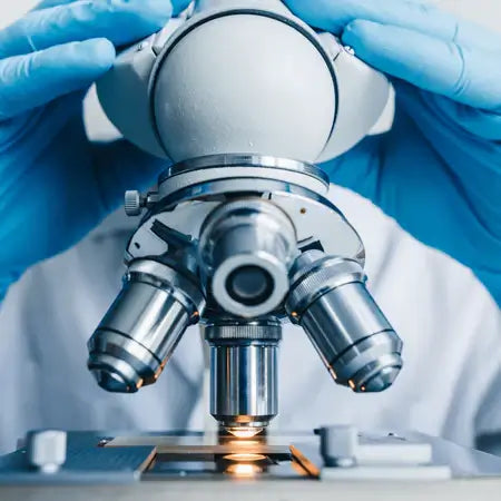 High magnification image of microscope lens used for microsphere analysis